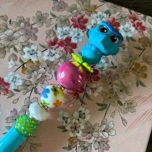 Disney Doorables: The Muppets: Sam (blacklight) handmade beaded pen